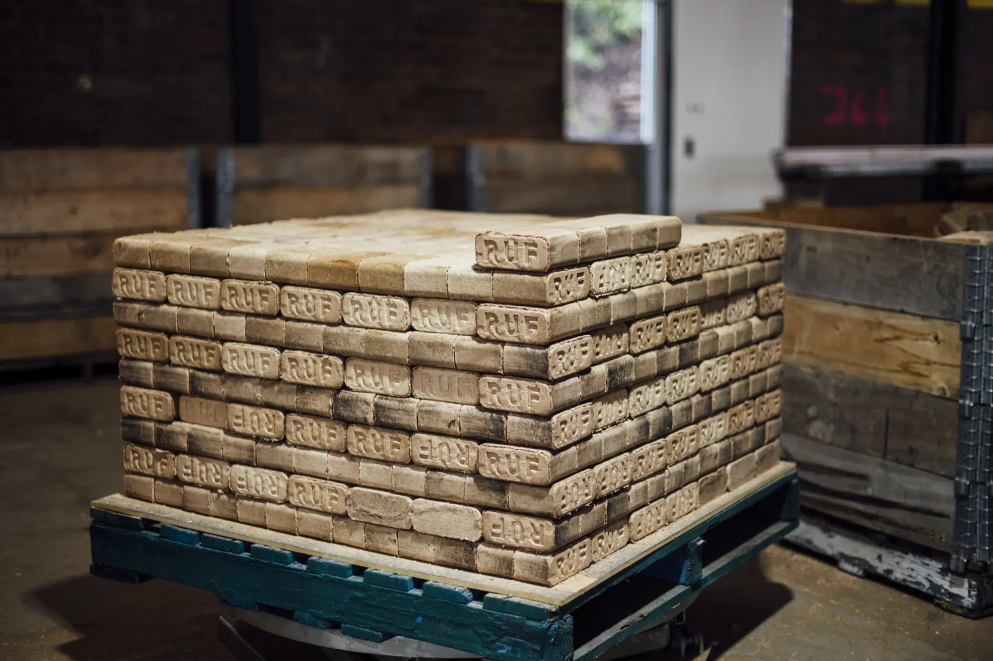 Pallet of RUF briquettes in a warehouse